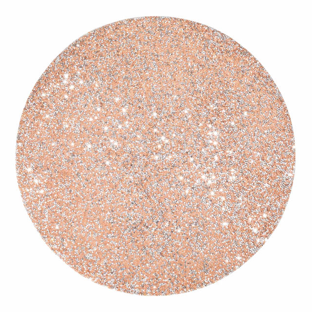 Round silver placemat with a textured surface adorned with vibrant rhinestones reflecting light for a sparkling effect.