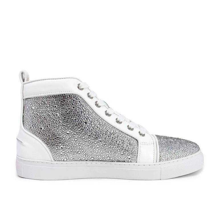 High-top sneakers with a white leather base and silver glass rhinestone embellishments on the sides and toe cap.