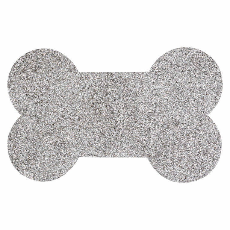 Silver dog bone-shaped placemat with a glittery non-slip surface and rounded ends.