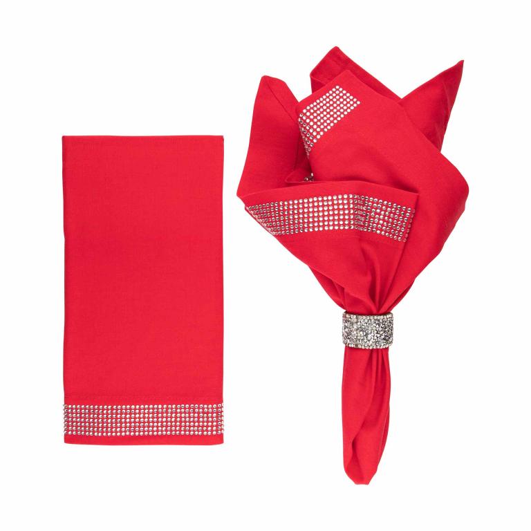 Red linen and cotton napkins with crystal rhinestone bands one flat and one elegantly folded with rhinestone embellishments.