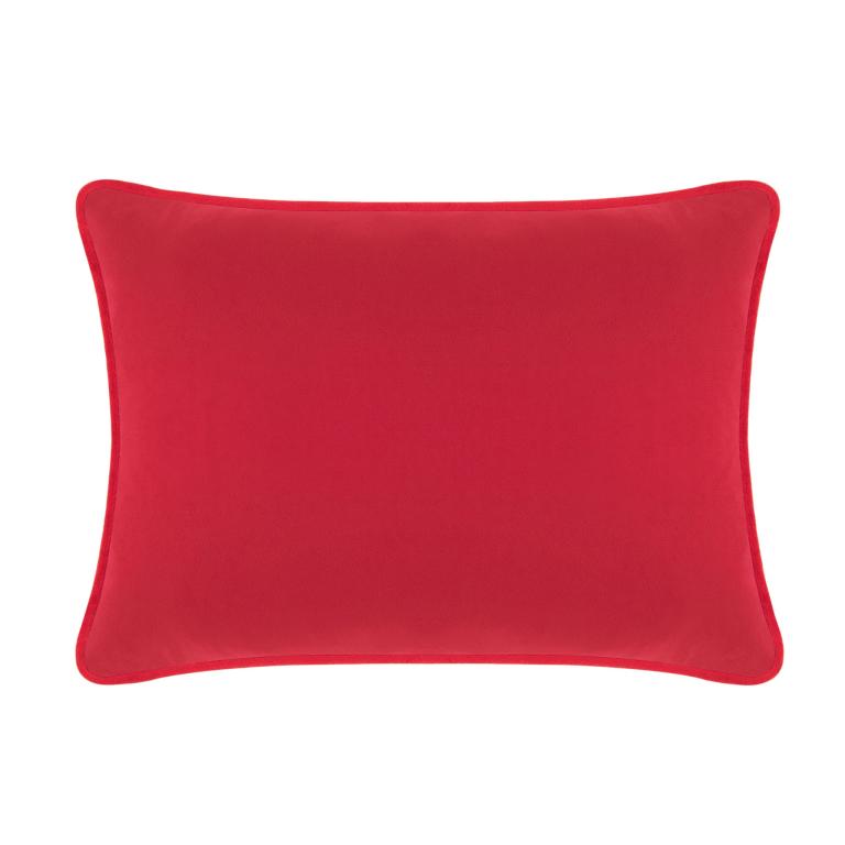 Red velvet rectangular pillow with a smooth texture and piped edges measuring 14x20 inches.
