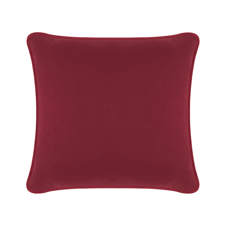 Burgundy velvet pillow with a smooth texture and rounded corners featuring a solid color without embellishments.