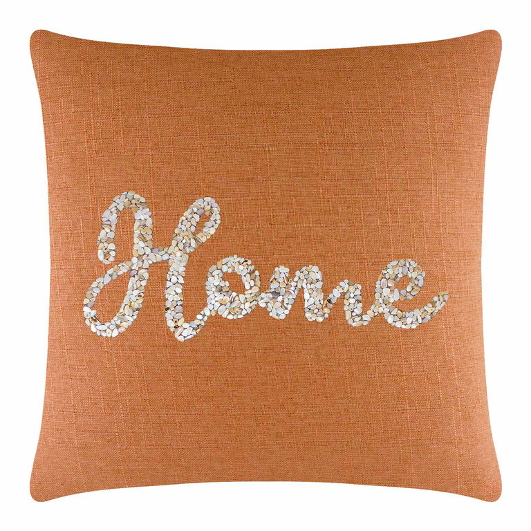 Square&#x20;orange&#x20;pillow&#x20;with&#x20;textured&#x20;fabric&#x20;featuring&#x20;seashells&#x20;forming&#x20;the&#x20;word&#x20;&quot;Home&quot;&#x20;in&#x20;white&#x20;and&#x20;beige&#x20;tones.