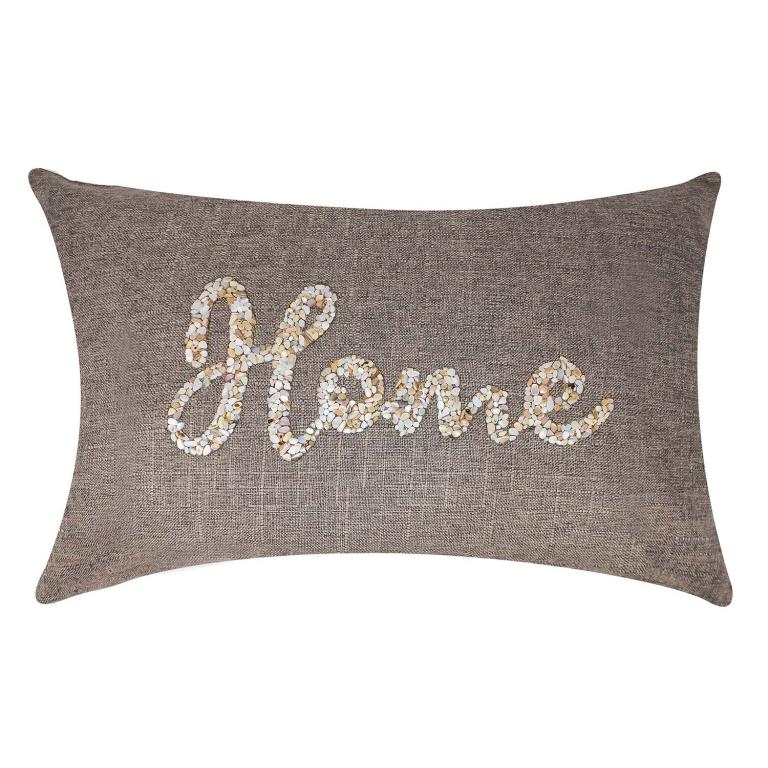 Rectangular&#x20;pillow&#x20;with&#x20;a&#x20;textured&#x20;taupe&#x20;fabric&#x20;featuring&#x20;seashells&#x20;arranged&#x20;to&#x20;spell&#x20;&quot;Home&quot;&#x20;in&#x20;white&#x20;and&#x20;beige&#x20;tones.