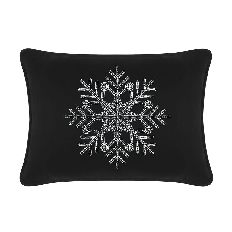 Black velvet pillow featuring a rhinestone snowflake design rectangular shape and smooth texture measuring 14x20 inches.