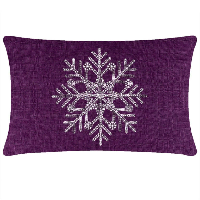 Purple&#x20;rectangular&#x20;pillow&#x20;with&#x20;a&#x20;textured&#x20;fabric&#x20;featuring&#x20;a&#x20;rhinestone&#x20;snowflake&#x20;design&#x20;in&#x20;silver.