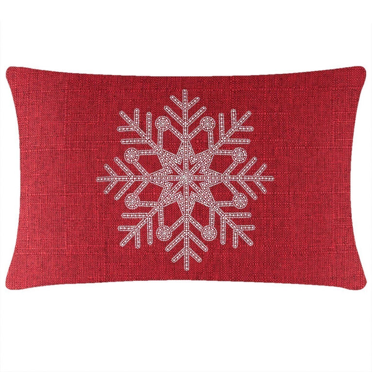 Red rectangular pillow with a textured fabric featuring a rhinestone snowflake design in the center.