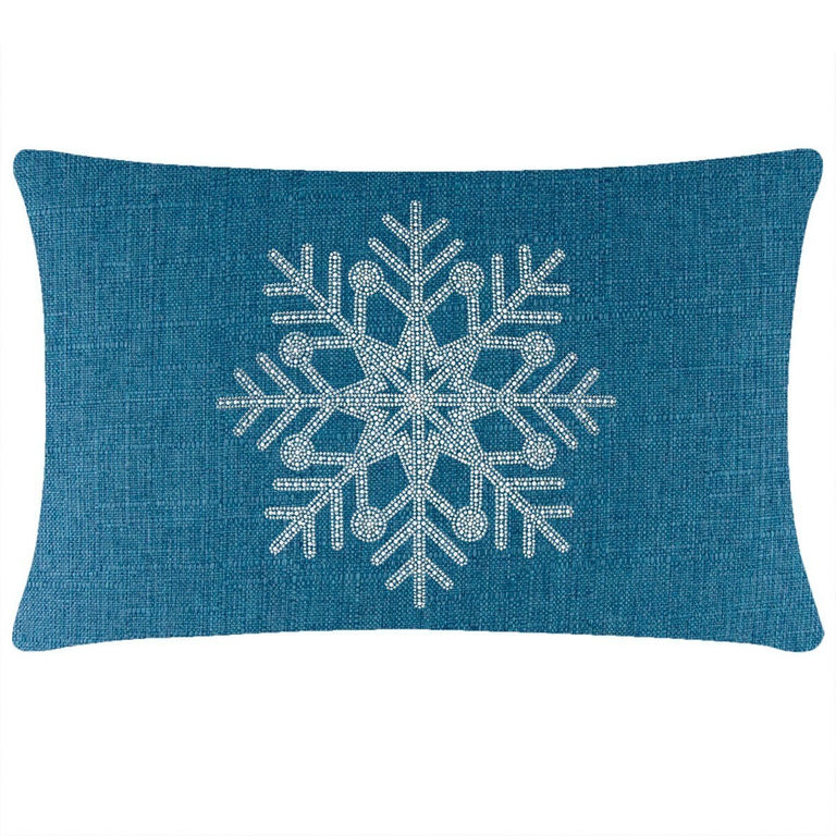 Rectangular teal pillow with a textured fabric featuring a large rhinestone snowflake design in the center.
