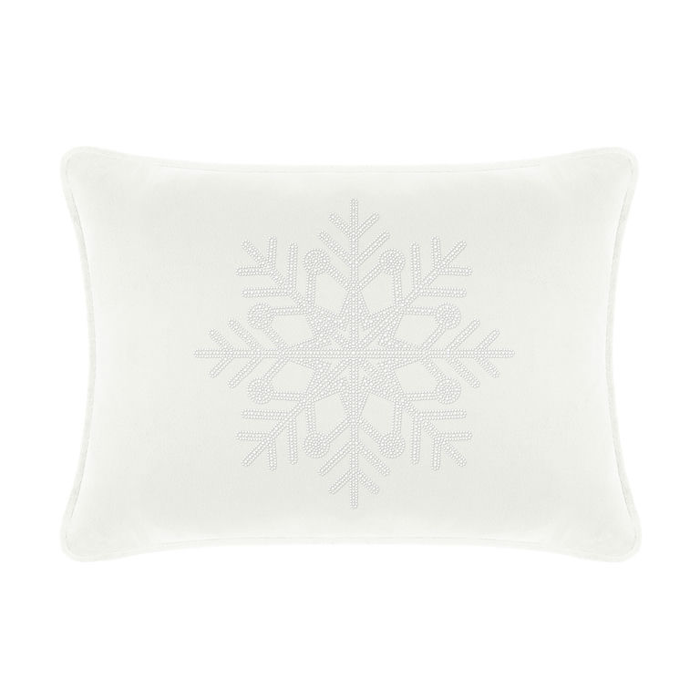White velvet pillow featuring a rhinestone snowflake design rectangular shape and soft texture.