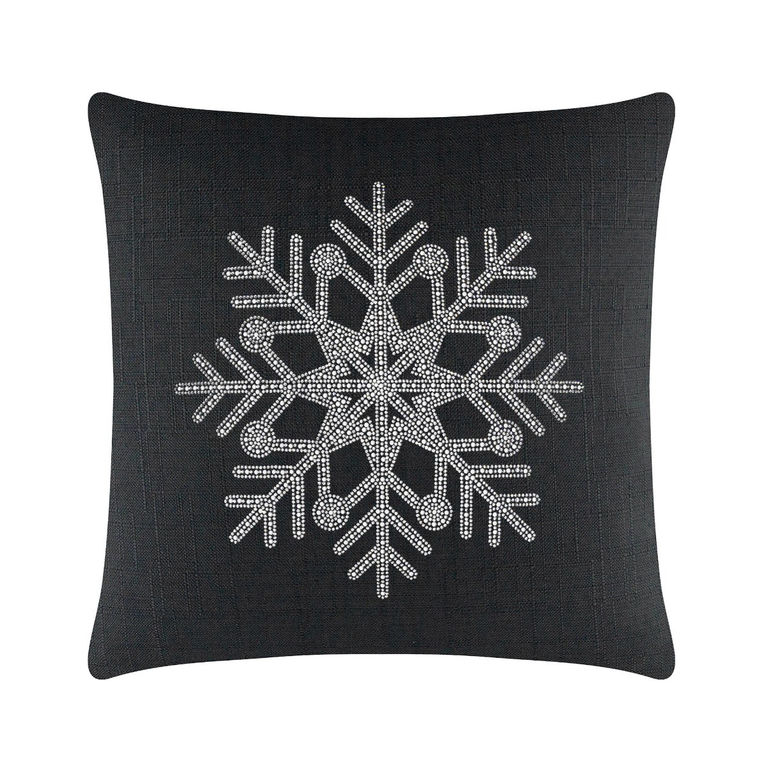 Black square pillow featuring a rhinestone snowflake design with intricate details and a textured fabric surface.