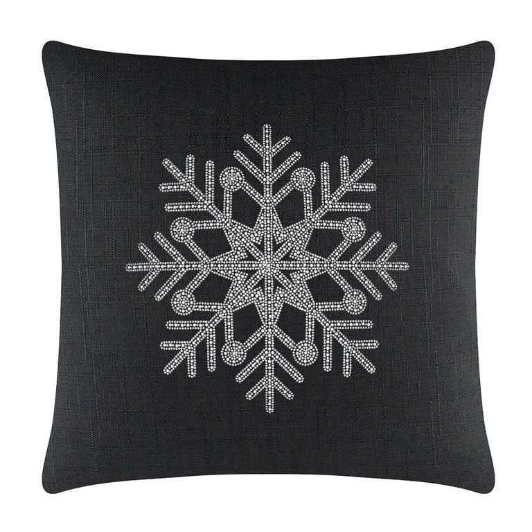 Black square pillow featuring a rhinestone snowflake design with intricate details and a textured fabric background.