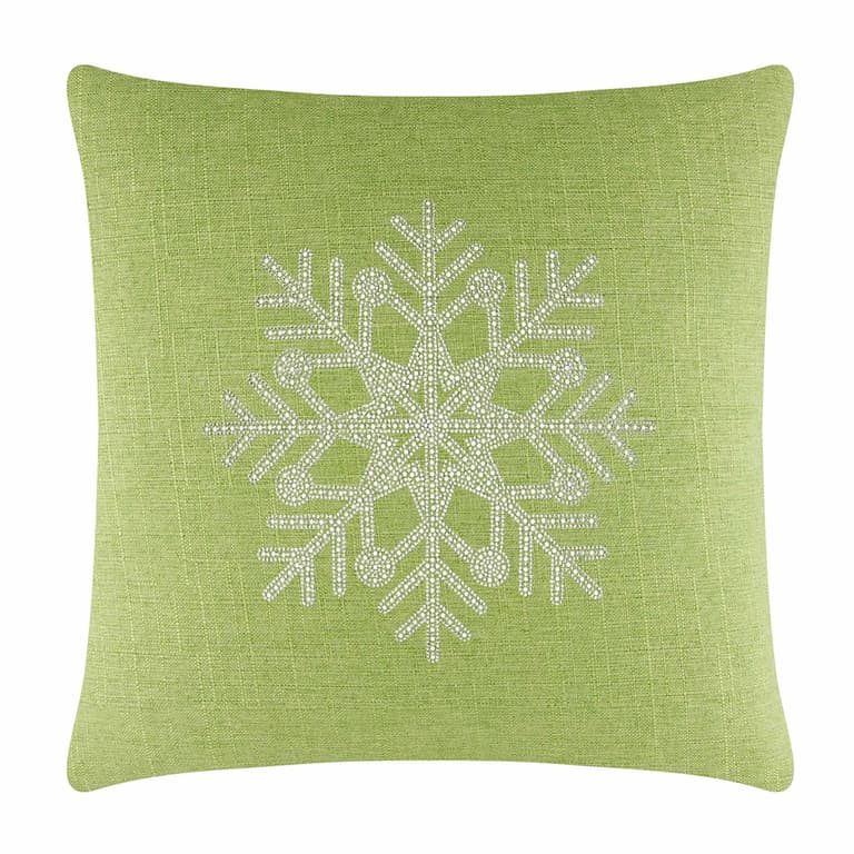 Lime green pillow with a textured fabric featuring a rhinestone snowflake design in the center.