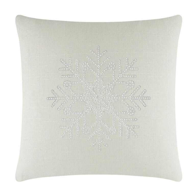 Square linen pillow in soft white with a textured surface and a rhinestone snowflake design in the center.