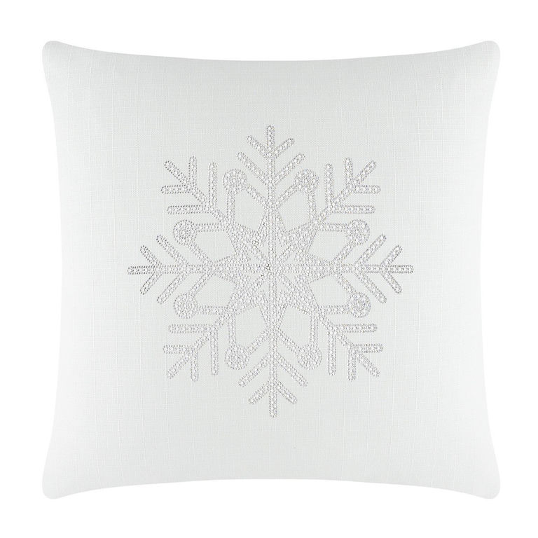 White square pillow featuring a textured fabric and a rhinestone snowflake design in the center.