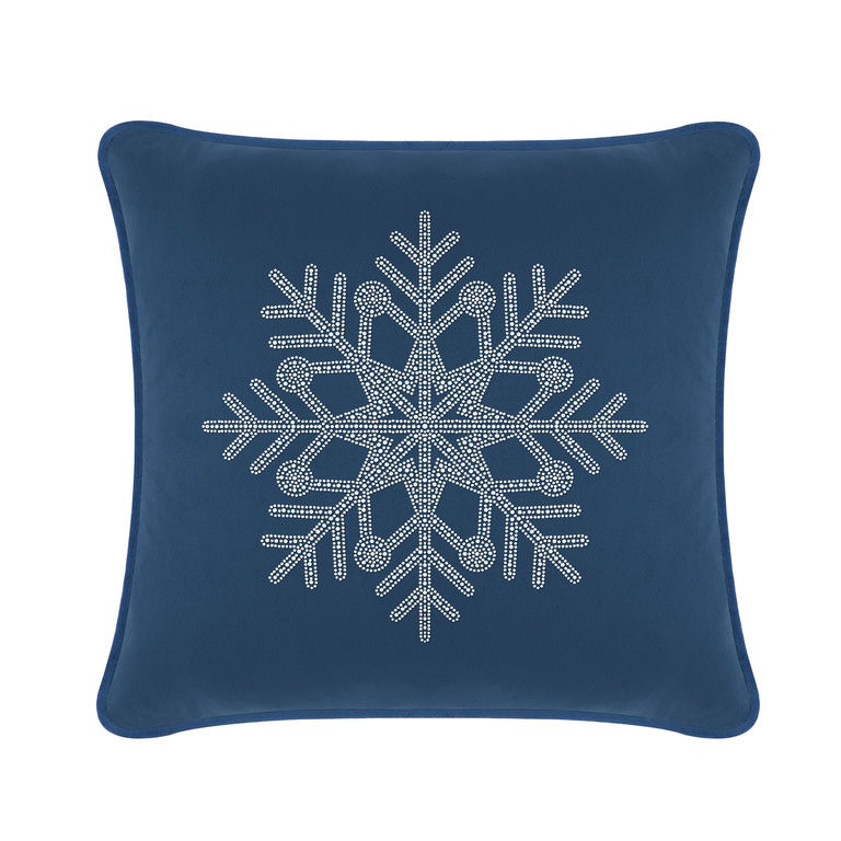Navy blue velvet pillow featuring a large rhinestone snowflake design in the center with intricate snowflake patterns.