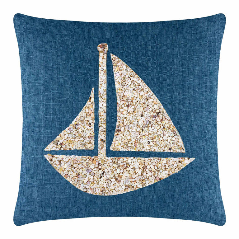 Square pillow with a deep blue woven texture featuring a beige seashell sailboat design in the center.