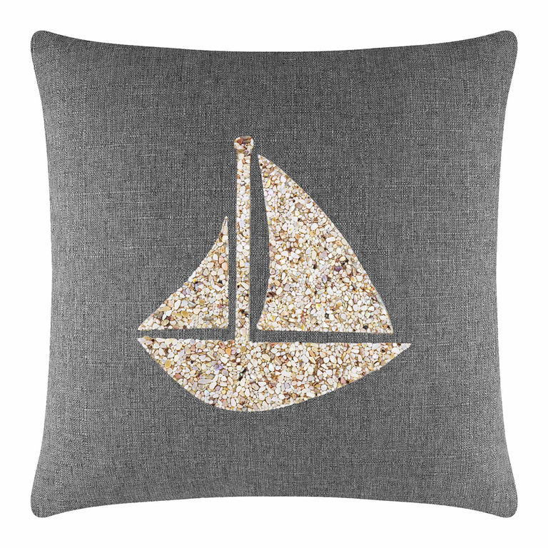 Gray&#x20;pillow&#x20;featuring&#x20;a&#x20;seashell&#x20;sailboat&#x20;pattern&#x20;in&#x20;beige&#x20;and&#x20;cream&#x20;on&#x20;a&#x20;textured&#x20;surface.