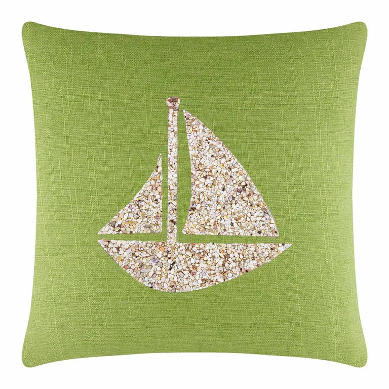 Lime green pillow with a textured fabric featuring a seashell sailboat design in beige and cream tones.