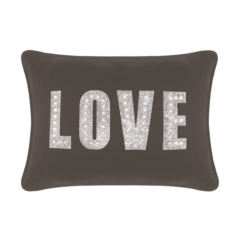 Charcoal velvet pillow with rhinestone and faux pearl embellishments spelling "LOVE" in large letters.