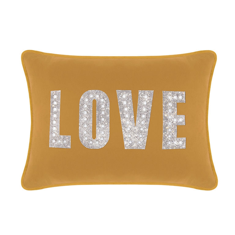 Gold velvet rectangular pillow featuring the word "LOVE" embellished with rhinestones and faux pearls.