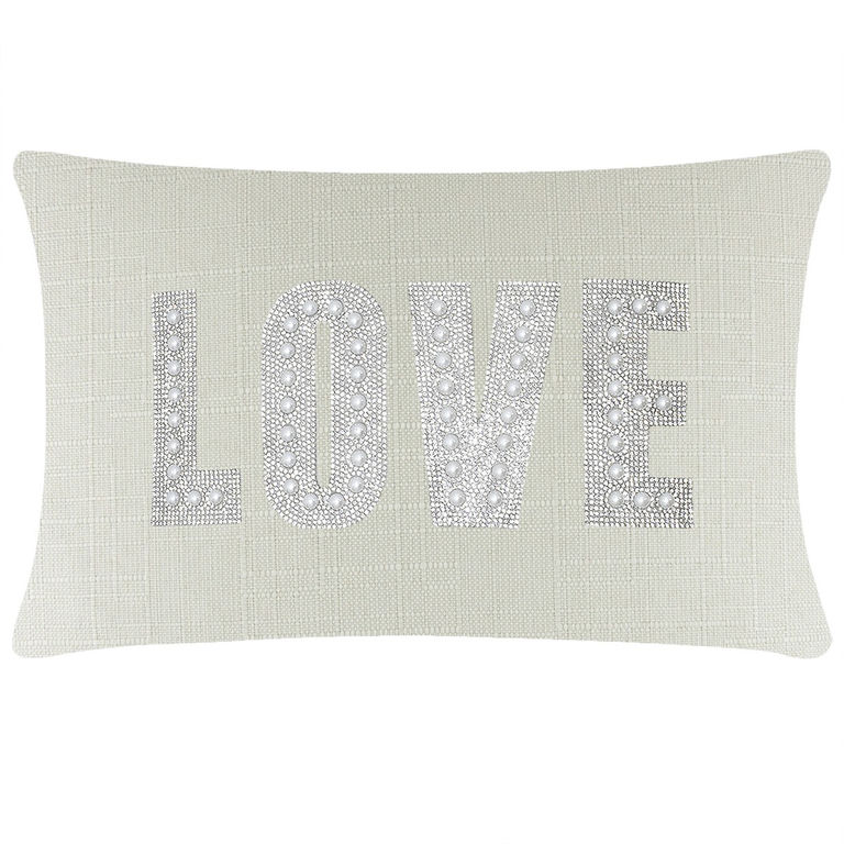 Rectangular light gray pillow with "LOVE" in rhinestones and faux pearls on a textured woven fabric.
