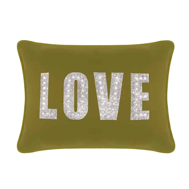 Olive green velvet pillow with rhinestone and faux pearl embellishments spelling "LOVE" in large letters.