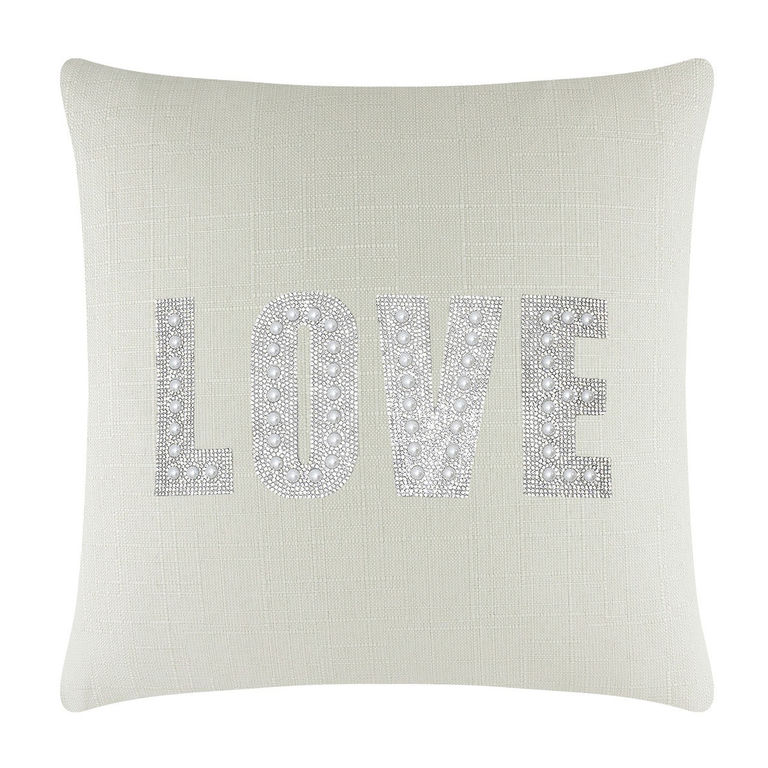 Square light beige linen pillow featuring the word "LOVE" in rhinestones and faux pearls.