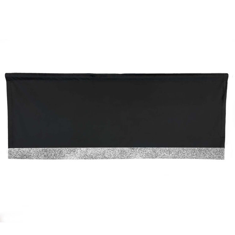 Black velvet valance with a silver rhinestone trim along the bottom edge rectangular shape smooth texture.