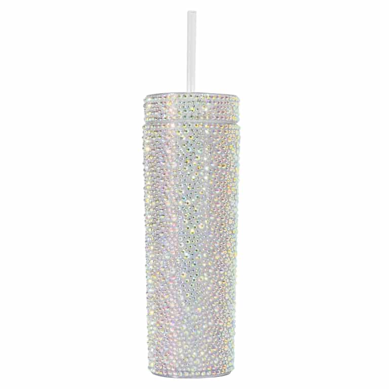 Silver iridescent tumbler covered in rhinestones with a white straw cylindrical shape and smooth texture.
