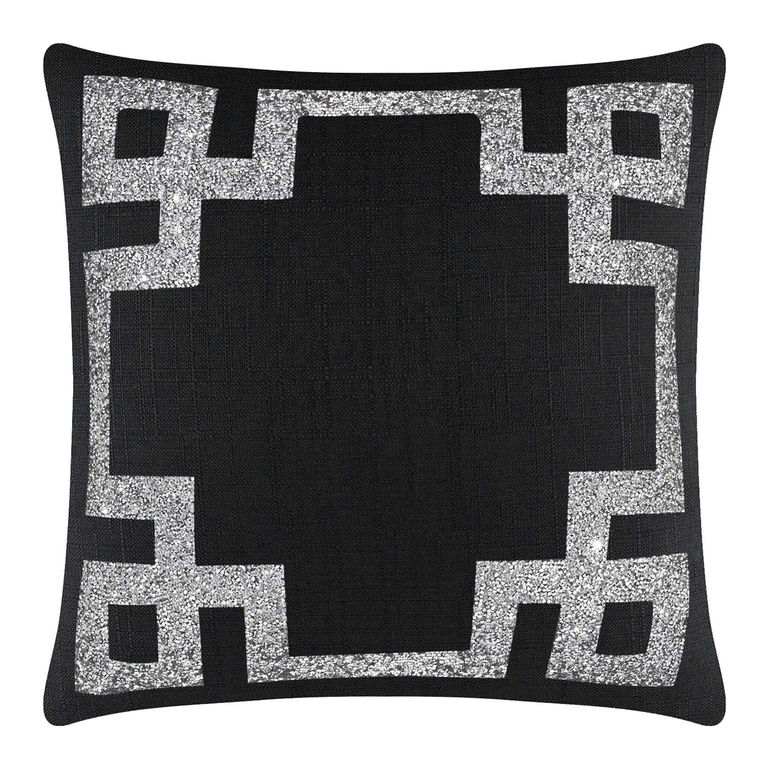 Black pillow featuring a Greek Key motif outlined in silver rhinestones with a textured fabric surface.