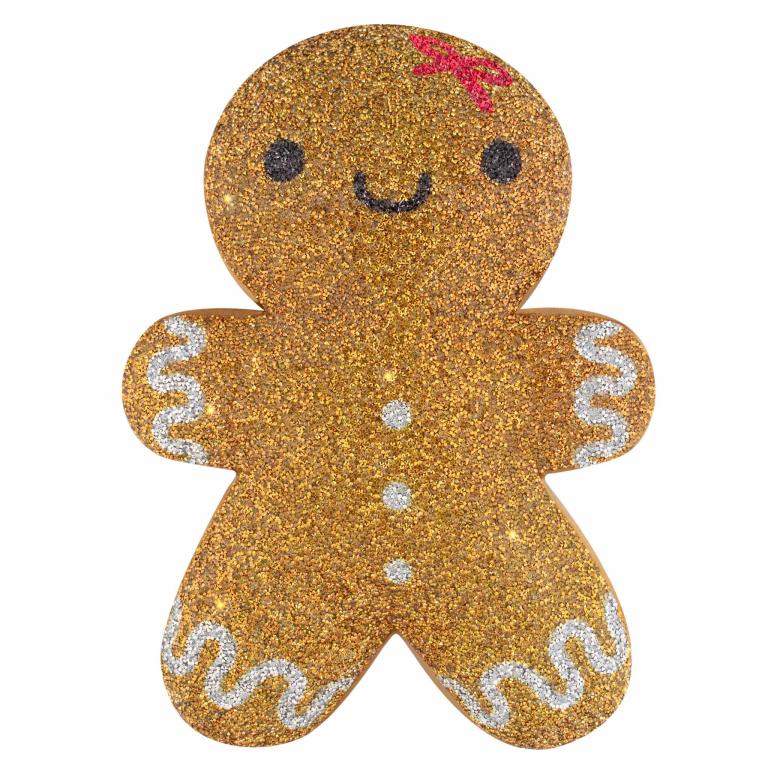 Gingerbread woman shaped pillow in golden-brown with red ribbon white icing details and a glittery texture.