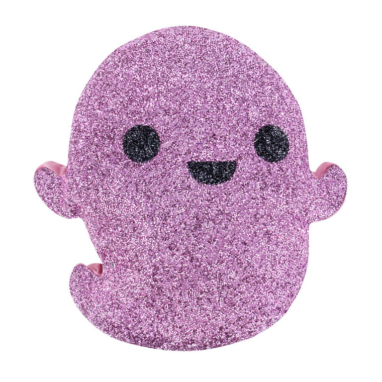 Pink ghost-shaped pillow covered in shimmering rhinestones with black eyes and a smile plush velvet texture rounded edges.