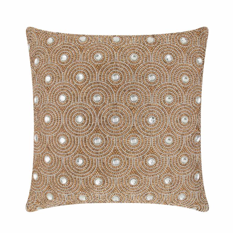 Gold velvet pillow with circular glass rhinestone embellishments in an orbital pattern featuring a textured surface.