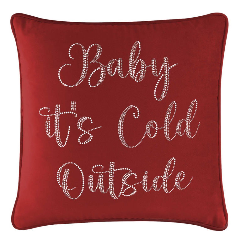 Red velvet pillow featuring glass rhinestones arranged in a cursive font with the text "Baby it's Cold Outside".