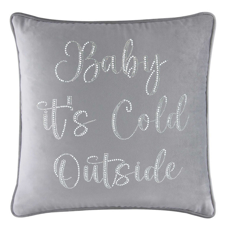 Silver velvet pillow with glass rhinestones spelling "Baby it's Cold Outside" bordered by a matching silver trim.