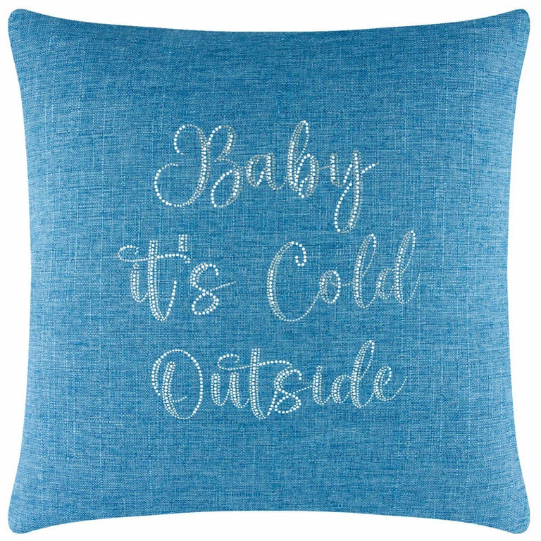 Aqua textured pillow with glass rhinestone embellishments spelling "Baby it's Cold Outside" in cursive font.