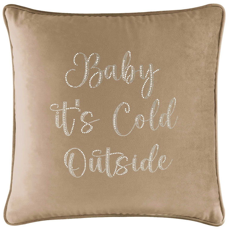 Champagne velvet pillow with glass rhinestone embellishments featuring the text "Baby it's Cold Outside" in cursive font.