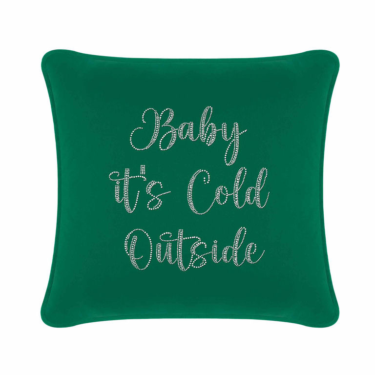 Emerald green velvet pillow with rounded corners and glass rhinestones spelling "Baby it's Cold Outside" in cursive font.
