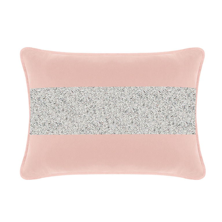 Blush velvet pillow with a silver rhinestone stripe rectangular shape smooth texture and piped edges.