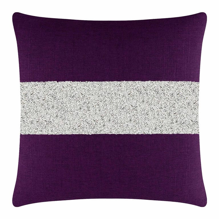 Purple pillow with a textured surface and a wide silver rhinestone stripe across the center.