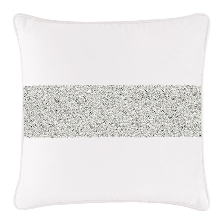 White velvet pillow with a silver rhinestone stripe square shape and piped edges.