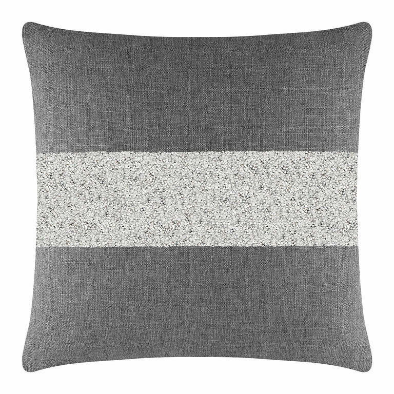 Gray pillow with a textured fabric featuring a wide silver rhinestone stripe across the center.