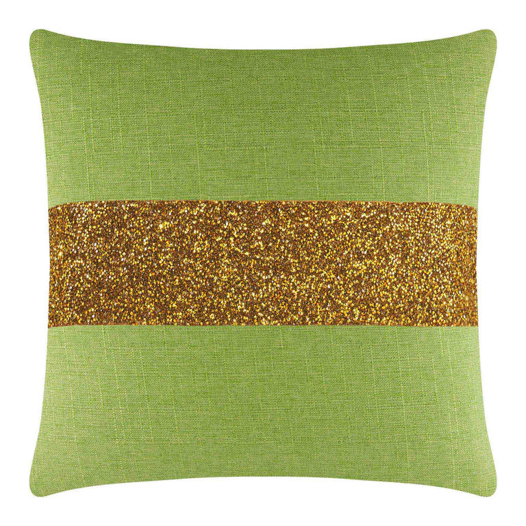 Lime green pillow with a gold glitter rhinestone stripe on a textured fabric surface.