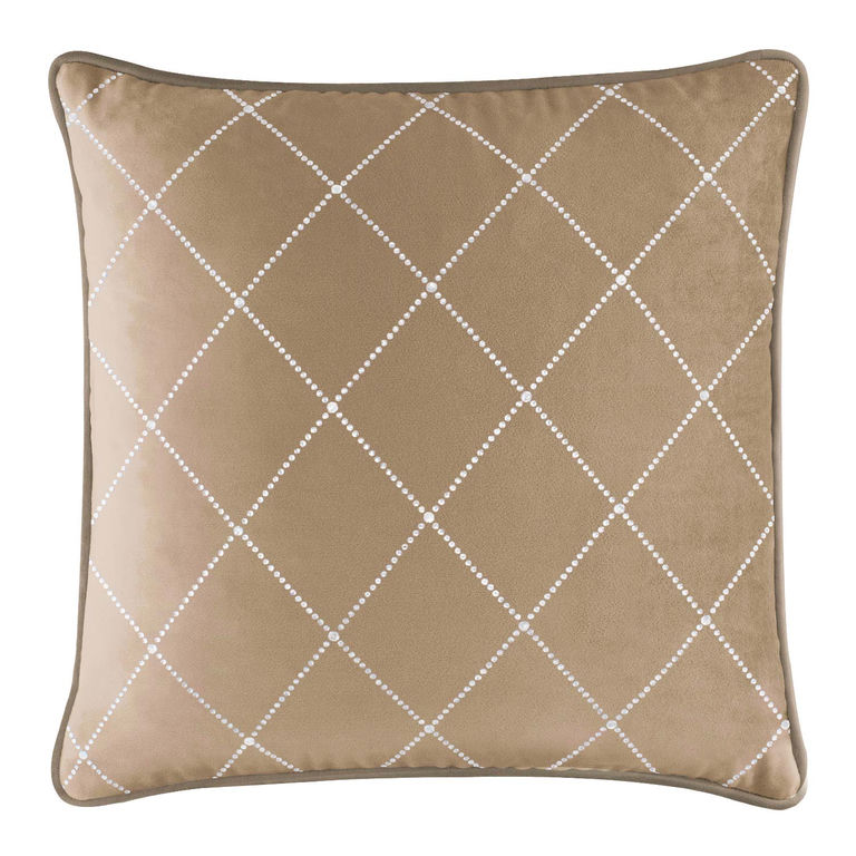 Champagne velvet pillow with a diamond pattern of shimmering rhinestones and a contrasting trim.