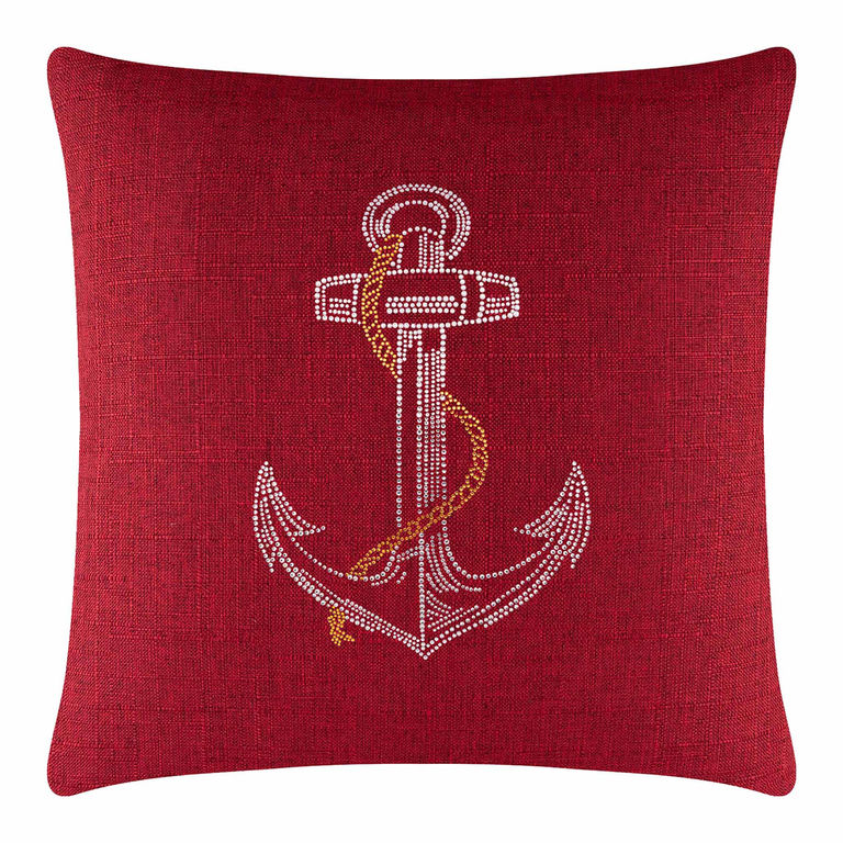 Red square pillow featuring a rhinestone-adorned anchor design with a gold rope detail on a textured fabric surface.