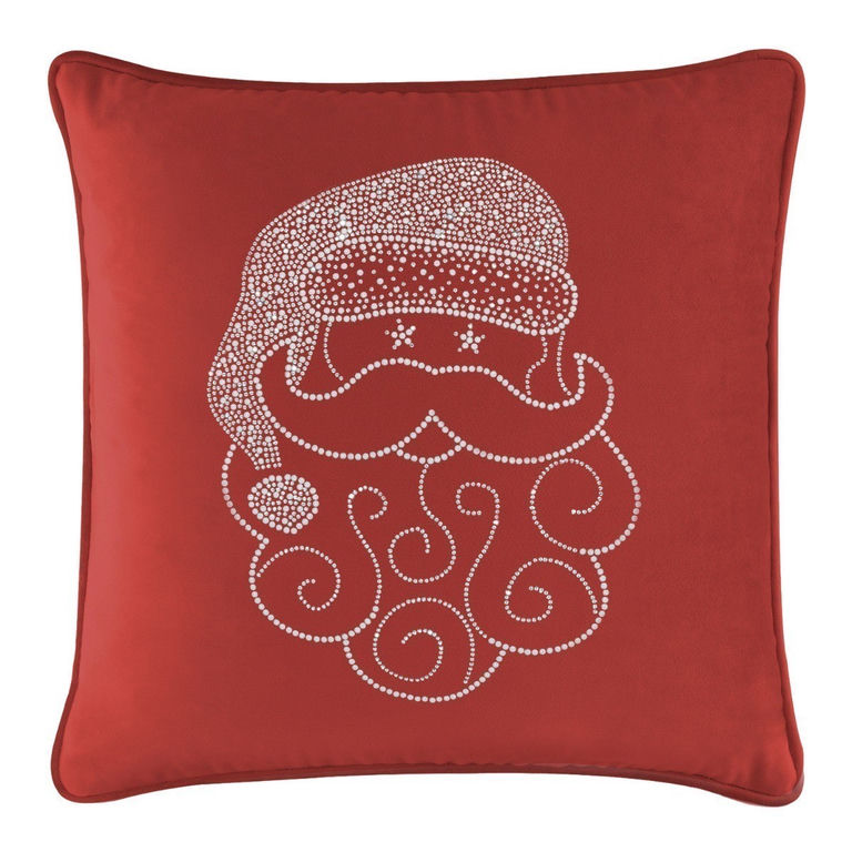 Red velvet pillow featuring a Santa face made of white rhinestones with a curly beard and a hat.
