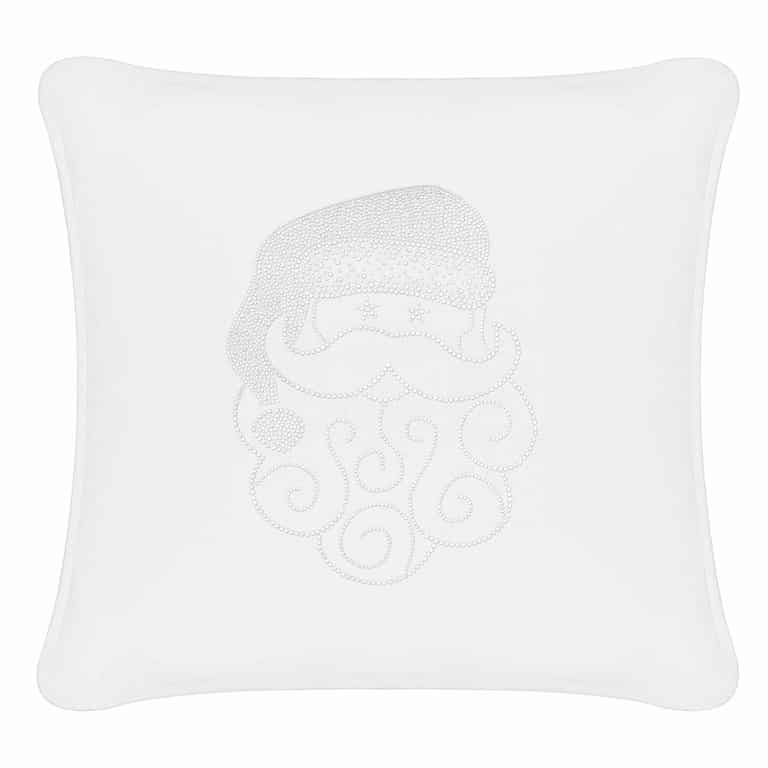 White velvet pillow featuring a Santa face design with rhinestone embellishments and swirled beard details.