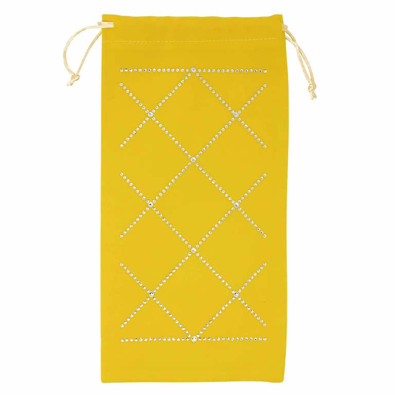 Yellow velvet wine bag with rhinestone embellishments in a crisscross pattern and a drawstring closure.