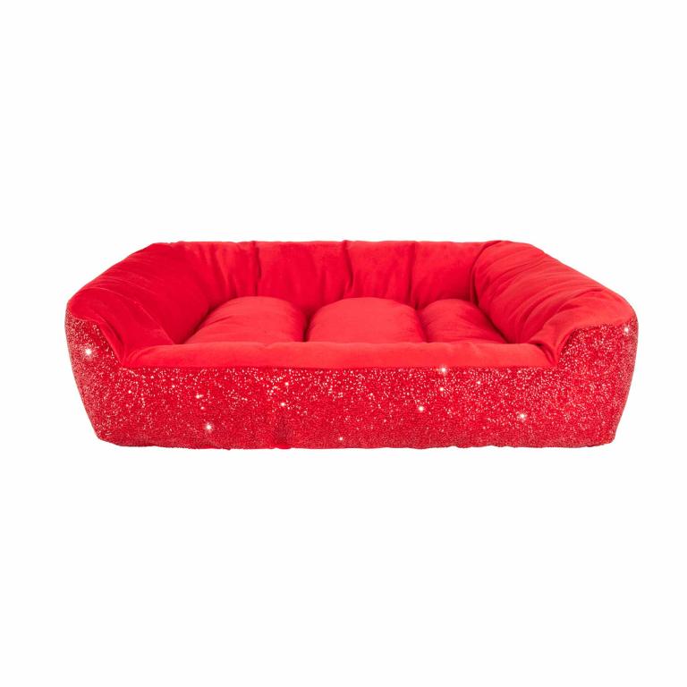 Small rectangular pet bed with plush red velvet interior and sparkling pink rhinestone exterior.
