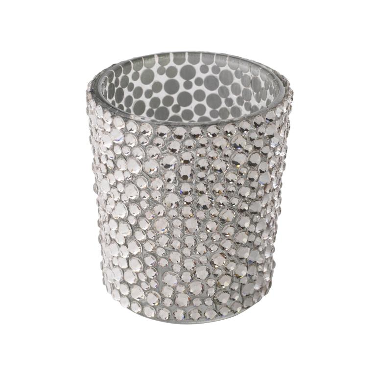 Crystal glass votive holder with hand-applied clear rhinestones cylindrical shape and a reflective silver interior.
